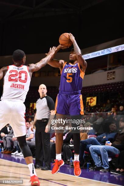 Anthony Lawrence II of the Northern Arizona Suns shoots against Josh Jackson of the Memphis Hustle on December 5 at the Findlay Toyota Center in...