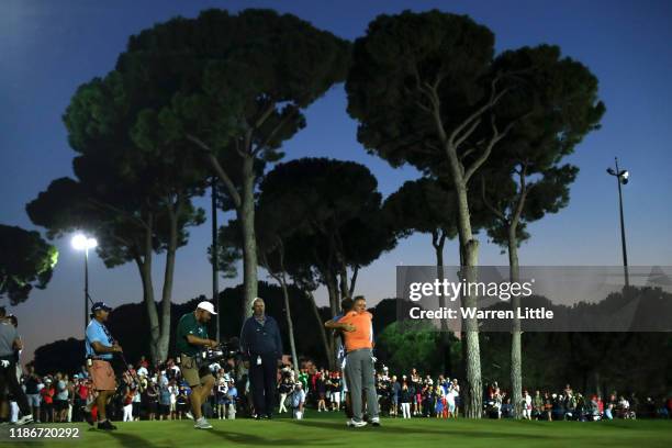 Tyrrell Hatton of England celebrates with his caddie Mick Donaghy after a playoff on the eighteenth green during Day Four of the Turkish Airlines...