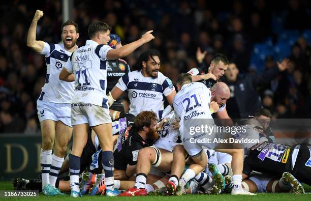 Luke Morahan , Piers O'Conor and Chris Vui celebrate Dan Thomas' try and victory during the Gallagher Premiership Rugby match between Exeter Chiefs...