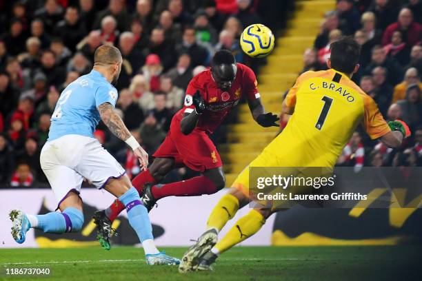 Sadio Mane of Liverpool scores his team's third goal during the Premier League match between Liverpool FC and Manchester City at Anfield on November...