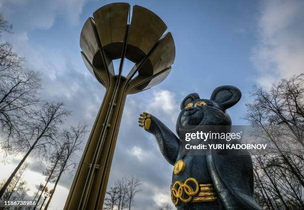 Sculpture of the mascot for the 1980 Moscow Olympics - Misha the bear - stands next to the 1980 Summer Olympics Cauldron near the Luzhniki stadium in...