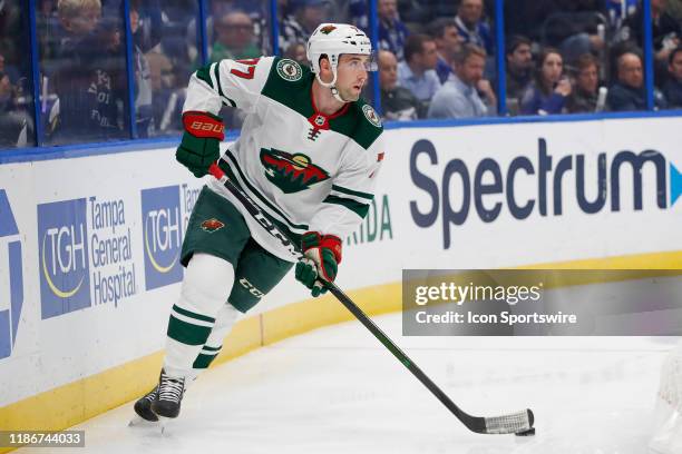 Minnesota Wild defenseman Brad Hunt skates with the puck in the 1st period of the NHL game between the Minnesota Wild and Tampa Bay Lightning on...