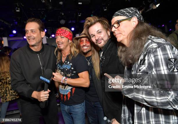 Bret Michaels, C.C. DeVille, Rikki Rockett, and Bobby Dall of Poison attend the press conference for THE STADIUM TOUR DEF LEPPARD - MOTLEY CRUE -...