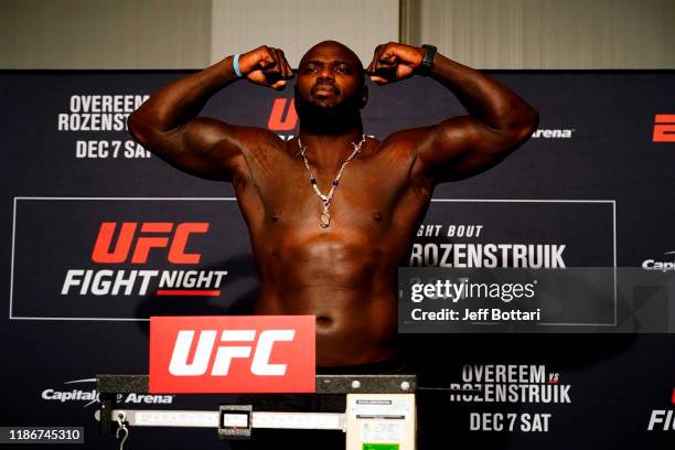 Jairzinho Rozenstruik of Suriname poses on the scale during the UFC Fight Night weigh-in on December 6, 2019 in Washington, DC.