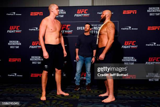 Stefan Struve of Netherlands and Ben Rothwell face off during the UFC Fight Night weigh-in on December 6, 2019 in Washington, DC.