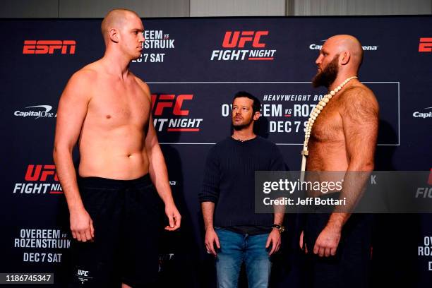 Stefan Struve of Netherlands and Ben Rothwell face off during the UFC Fight Night weigh-in on December 6, 2019 in Washington, DC.