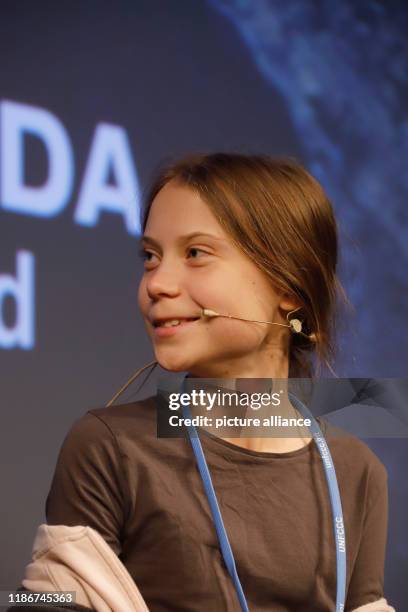 December 2019, Spain, Madrid: Climate activist Greta Thunberg from Sweden takes part in a press conference with other young activists. Thunberg is to...