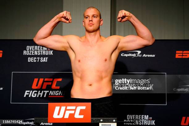 Stefan Struve of Netherlands poses on the scale during the UFC Fight Night weigh-in on December 6, 2019 in Washington, DC.