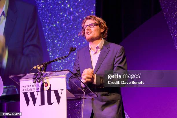 Julian Rhind-Tutt on stage at the Women in Film and TV Awards 2019 at Hilton Park Lane on December 06, 2019 in London, England.