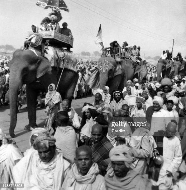 Sadhus procession, on elephants back, to celebrate Kumbh Mela on February 3, 1954 in Allahabad. - 5 million faithful gathered to celebrate Kumbh Mela...