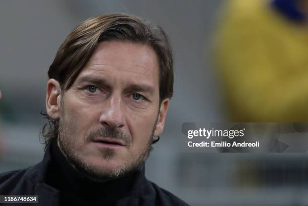 Roma former player Francesco Totti looks on prior to the Serie A match between FC Internazionale and AS Roma at Stadio Giuseppe Meazza on December 6,...