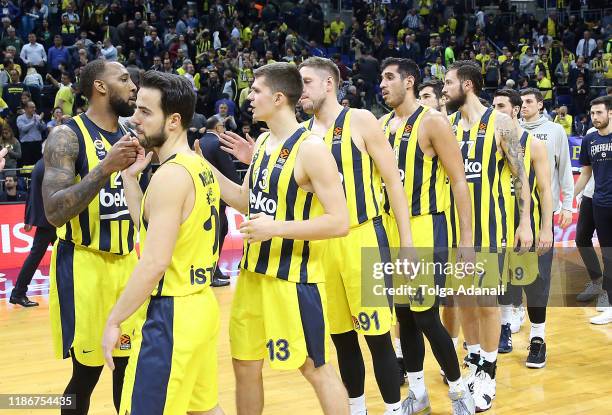 Fenerbahce Beko players celebrate during the 2019/2020 Turkish Airlines EuroLeague Regular Season Round 12 match between Fenerbahce Beko Istanbul and...