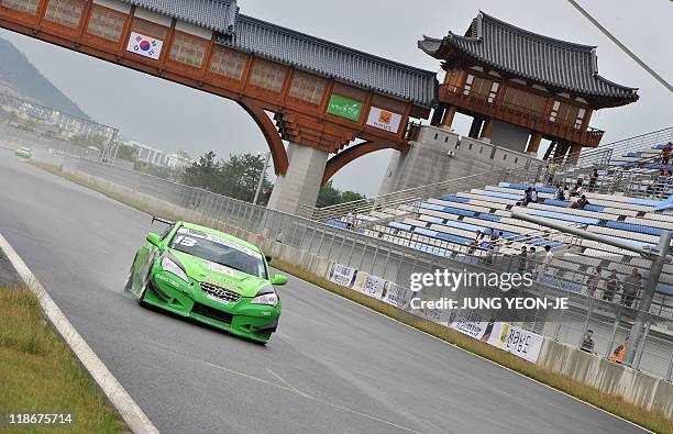 Sports car takes part in an event to mark the 100-day countdown to the upcoming Korean Formula One Grand Prix at the Korean International Circuit in...