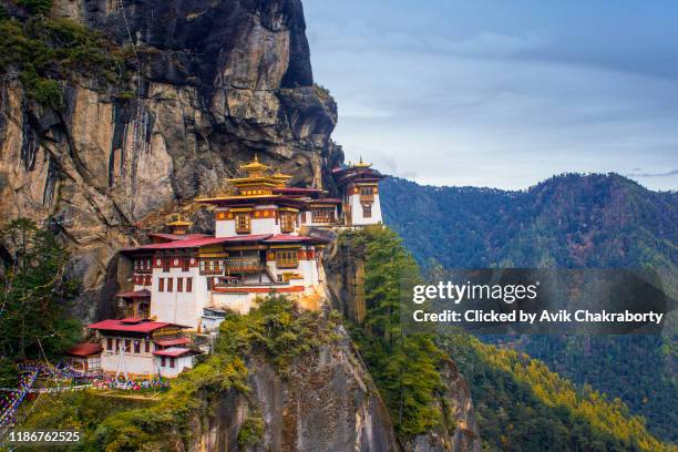 taktsang dzongkha (tiger's nest) in bhutan - paro valley stock pictures, royalty-free photos & images