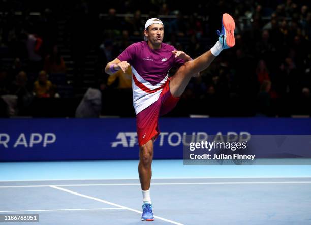 Lukasz Kubot of Poland, playing partner of Marcelo Melo of Brazil celebrates his team's victory after his doubles match against Ivan Dodig of Croatia...