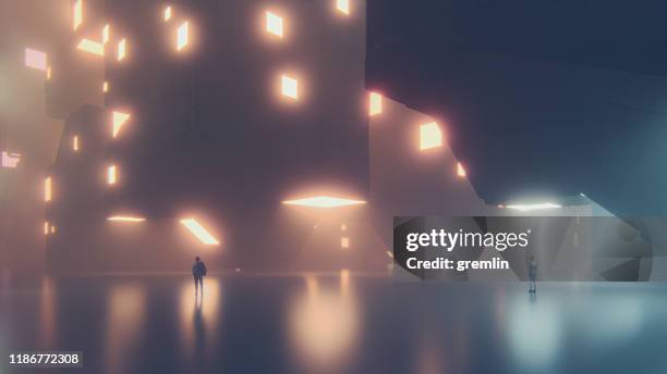 eenzame mensen in grote, lege futuristische stad - light architecture stockfoto's en -beelden