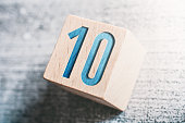 Number 10 On A Wooden Block On A Table