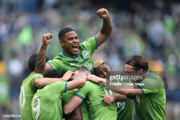 Roman Torres of Seattle Sounders FC celebrates the 1st goal with his teammates during the match between Toronto FC and Seattle Sounders as part of...