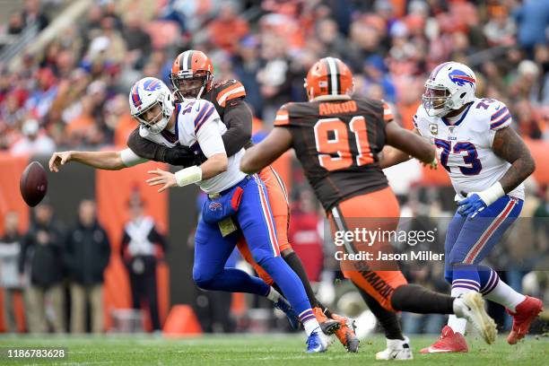 Quarterback Josh Allen of the Buffalo Bills is sacked by defensive end Myles Garrett of the Cleveland Browns during the first half at FirstEnergy...