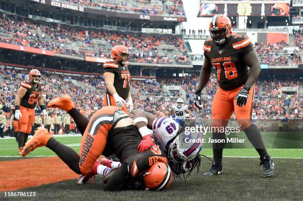 Quarterback Baker Mayfield of the Cleveland Browns is sacked for a safety by defensive back Jaquan Johnson of the Buffalo Bills during the second...