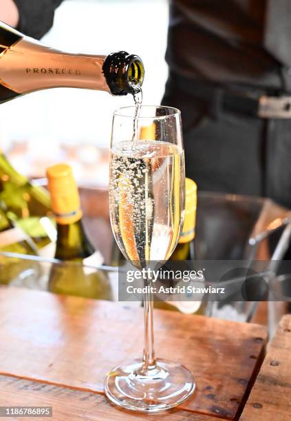 Bartender pours a glass of prosecco during the 2019 Glamour Women of the Year Summit Experiences at Chef’s Dinner Table on November 10, 2019 in New...