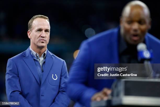 Peyton Manning on the stage during Dwight Freeney's induction to the Colts Ring of Honor during halftime of the game between the Indianapolis Colts...