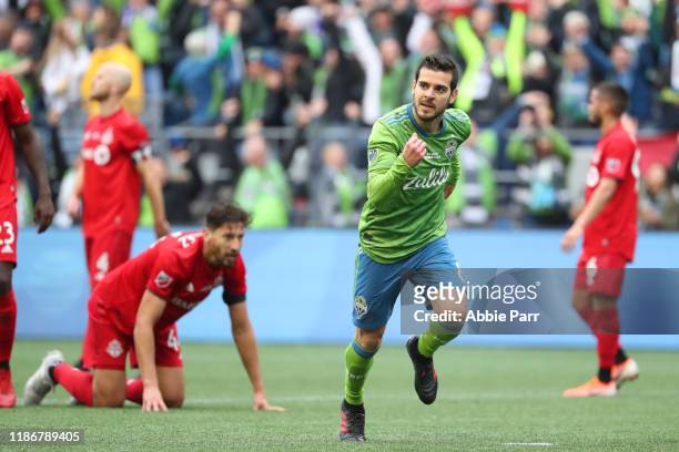 Victor Rodriguez of the Seattle Sounders celebrates after scoring a goal in the second half to give the Seattle Sounders a 2-0 lead against Toronto...