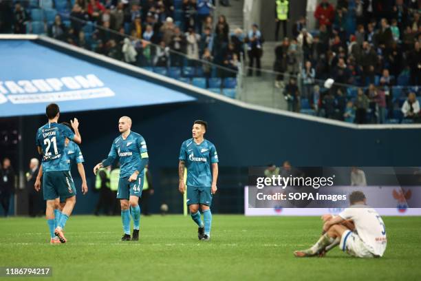 Players of Zenit celebrate after the Russian Football Premier League match between Zenit St. Petersburg and Dinamo Moscow at Gazprom Arena. .