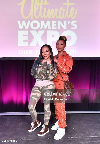 Tameka "Tiny" Harris and Zonnique Pullins attend 2019 Atlanta Ultimate Women's Expo at Cobb Galleria Centre on November 10, 2019 in Atlanta, Georgia.