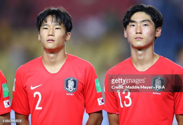 Taeseok Lee of Korea Republic and Ryunseong Kim of Korea Republic look on during the quarterfinal match between Korea Republic and Mexico in the FIFA...