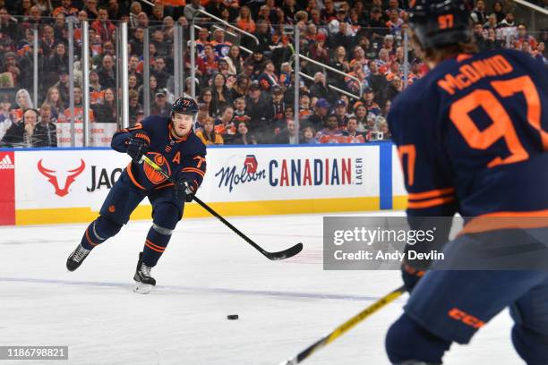 Oscar Klefbom of the Edmonton Oilers passes the puck during the game against the Los Angeles Kings on December 6 at Rogers Place in Edmonton,...