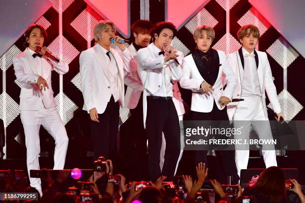 South Korean boy band BTS performs onstage during the KIIS FM's iHeartRadio Jingle Ball at the Forum Los Angeles in Inglewood, California on December...
