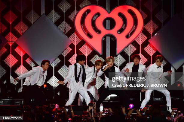 South Korean boy band BTS performs onstage during the KIIS FM's iHeartRadio Jingle Ball at the Forum Los Angeles in Inglewood, California on December...