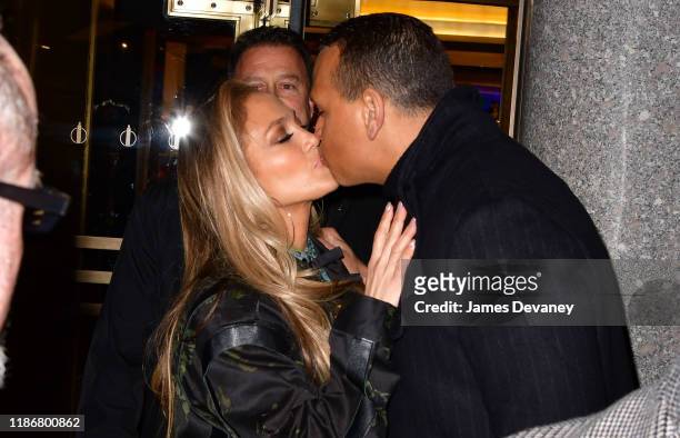 Jennifer Lopez and Alex Rodriguez kiss outside Rockefeller Center on December 6, 2019 in New York City.