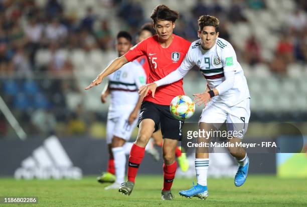 Woojin Bang of Korea Republic in action against Santiago Munoz of Mexico during the quarterfinal match between Korea Republic and Mexico in the FIFA...