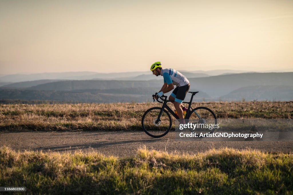 Cycling outdoors.