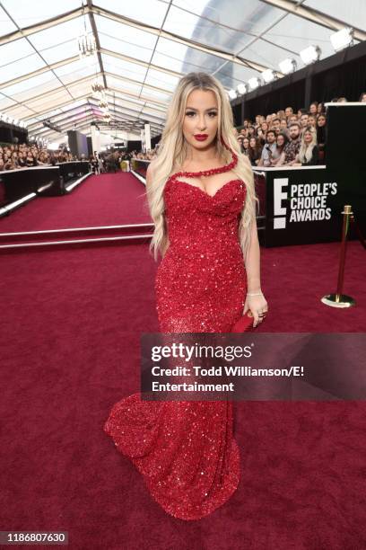 Pictured: Tana Mongeau arrives to the 2019 E! People's Choice Awards held at the Barker Hangar on November 10, 2019. -- NUP_188990