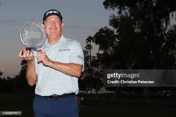 Winner of the Charles Schwab Cup Championship , Jeff Maggert poses with the trophy during the final round at Phoenix Country Club on November 10,...