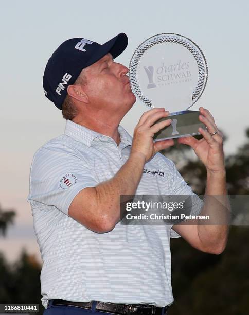 Winner of the Charles Schwab Cup Championship , Jeff Maggert poses with the trophy during the final round at Phoenix Country Club on November 10,...
