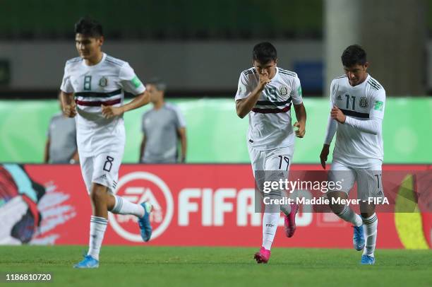 Ali Avila of Mexico celebrates the first goal for his team with his teammates during the quarterfinal match between Korea Republic and Mexico in the...