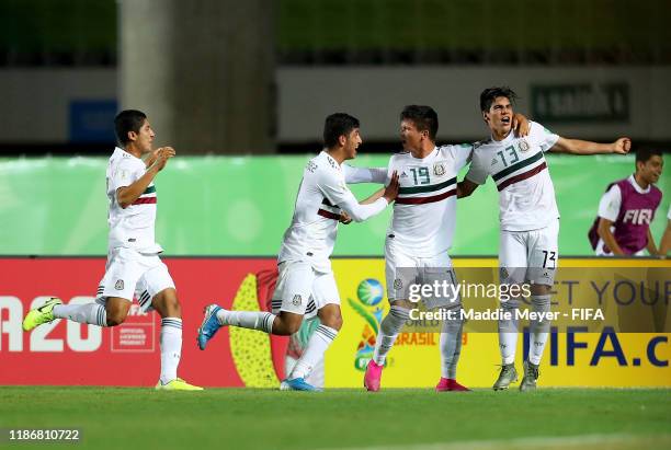 Ali Avila of Mexico celebrates the first goal for his team with his teammates during the quarterfinal match between Korea Republic and Mexico in the...