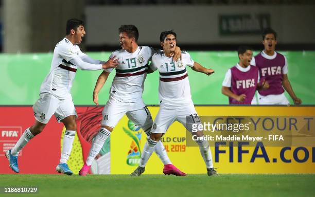 Ali Avila of Mexico celebrates the first goal for his team with his teammates during the quarterfinal match between Korea Republic and Mexico in the...
