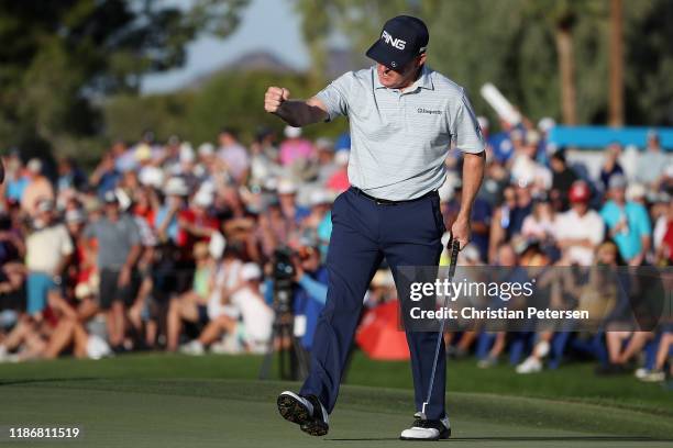 Jeff Maggert celebrates his birdie putt on the 18th green during the final round of the Charles Schwab Cup Championship at Phoenix Country Club on...