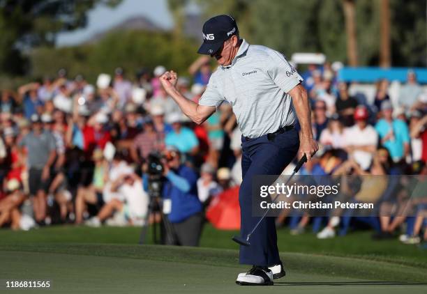 Jeff Maggert celebrates his birdie putt on the 18th green during the final round of the Charles Schwab Cup Championship at Phoenix Country Club on...