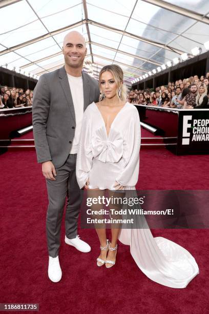 Pictured: Mike Caussin and Jana Kramer arrive to the 2019 E! People's Choice Awards held at the Barker Hangar on November 10, 2019. -- NUP_188990