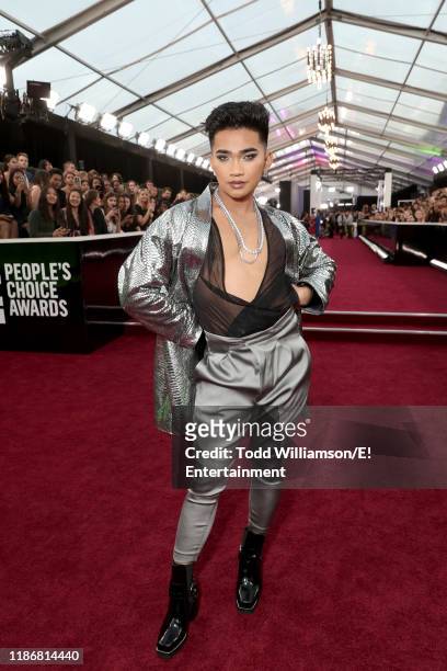 Pictured: Bretman Rock arrives to the 2019 E! People's Choice Awards held at the Barker Hangar on November 10, 2019. -- NUP_188990