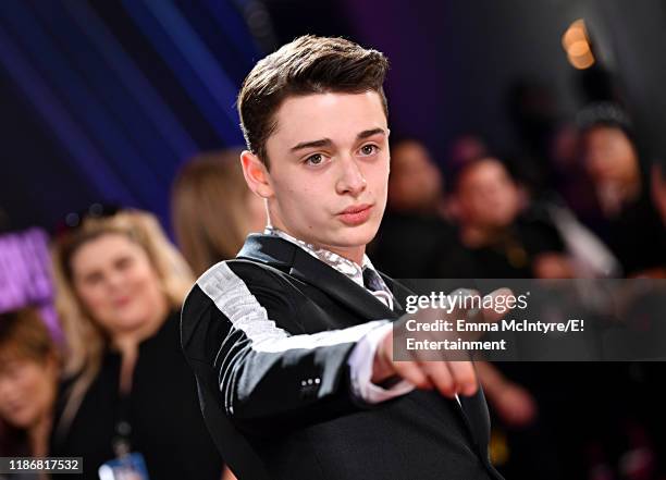 Pictured: Noah Schnapp arrives to the 2019 E! People's Choice Awards held at the Barker Hangar on November 10, 2019. -- NUP_188994