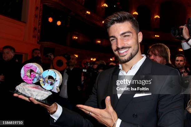 Influencer and award winner Mariano Di Vaio is seen on stage during the GQ Men of the Year Award show at Komische Oper on November 7, 2019 in Berlin,...