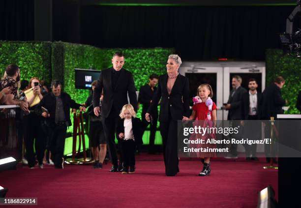 Pictured: Carey Hart, Jameson Hart, Pink, and Willow Hart arrive to the 2019 E! People's Choice Awards held at the Barker Hangar on November 10,...