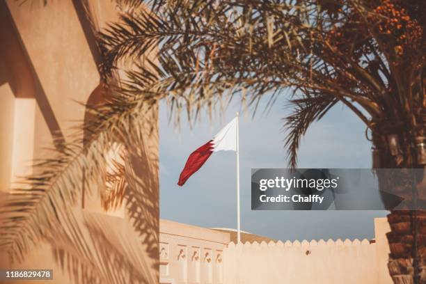 national museum of qatar exterior - qatari flag stock pictures, royalty-free photos & images